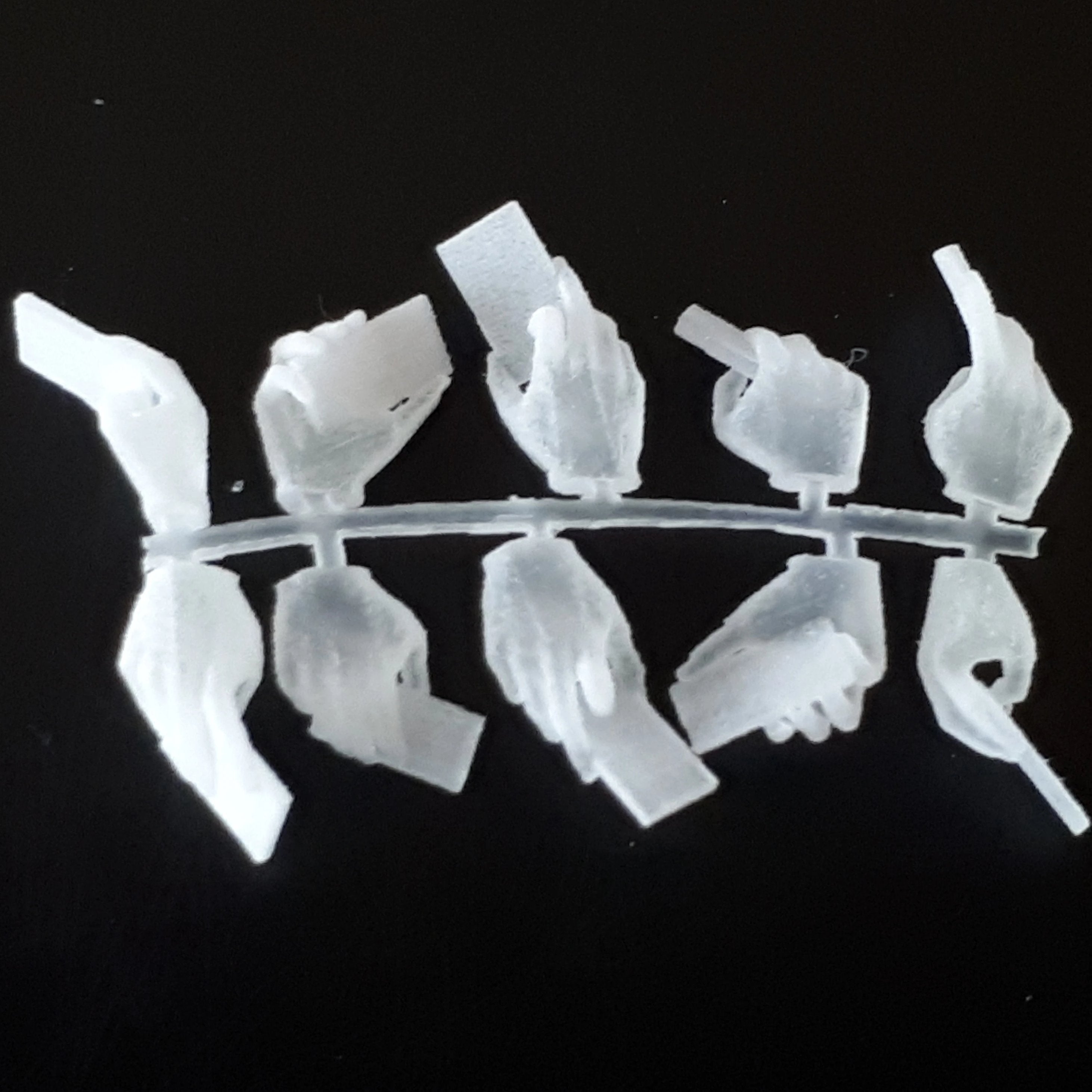 1:35 Hands Holding Smartphones